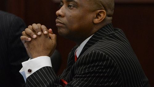 Shown here during the trial where he faced 27 felony charges, Clayton County Sheriff Victor Hill now faces a misdemeanor charge in the shooting of a woman last month. With the latest incident involving Hill on the other side of the law, should he face criminal charges or be let go since he and victim say it was an accidental shooting.