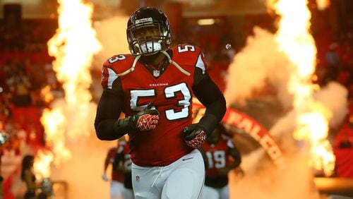 Exonerated Falcons linebacker Brian Banks takes the field through the flames for a NFL preseason game against the Jaguars.
