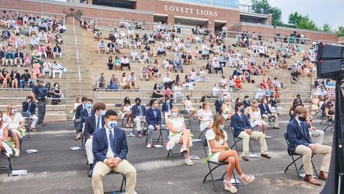 Safety precautions, including wearing of masks and social distancing, were taken during a graduation ceremony at the Lovett School on Thursday. The school has since learned that a graduate who attended may have been asymptomatic. (Photo courtesy of Lovett School)