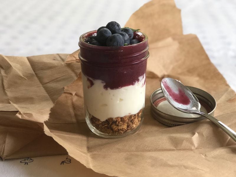 Assemble jars of berry coulis and Greek yogurt in advance for protein-packed snacks to go. CONTRIBUTED BY KELLIE HYNES