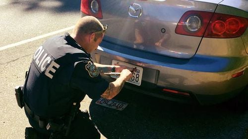 Officer Jim Allen was praised after he helped changed the license plate for a woman who was pulled over. "I'm 38 weeks pregnant & it's super hard for me to bend over," the woman, Amby Johnson wrote on Facebook. "I got pulled over today & instead of giving me a ticket for not having my new plates on, this Officer gladly helped put them on."