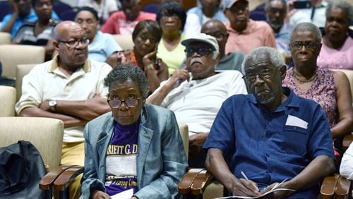 Fulton County residents listen to a presentation during an Emergency Town Hall Meeting earlier this month.