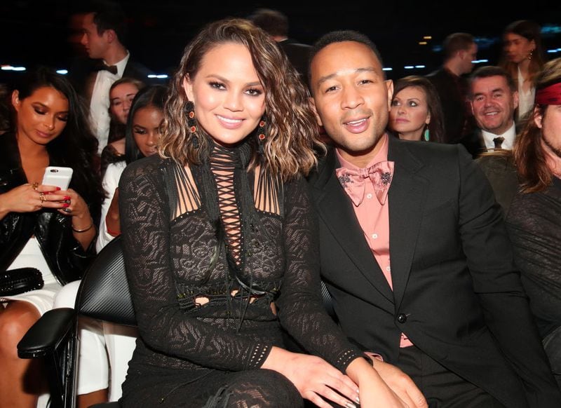 Media Personality Chrissy Teigen and musician John Legend during The 59th GRAMMY Awards at STAPLES Center on February 12, 2017 in Los Angeles, California.  (Photo by Christopher Polk/Getty Images for NARAS)