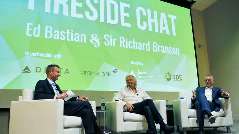 Delta CEO Ed Bastian and Virgin founder Richard Branson held a "fireside chat" event moderated by Junior Achievement of Georgia president Jack Harris at the Georgia World Congress Center.    BOB ANDRES  /BANDRES@AJC.COM