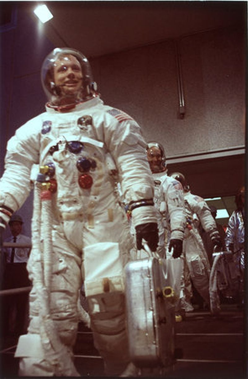 The Apollo 11 astronauts make their way to the craft.