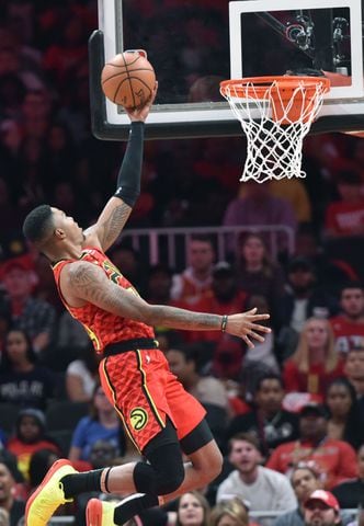 Photos: Hawks rally to beat Mavs in home opener