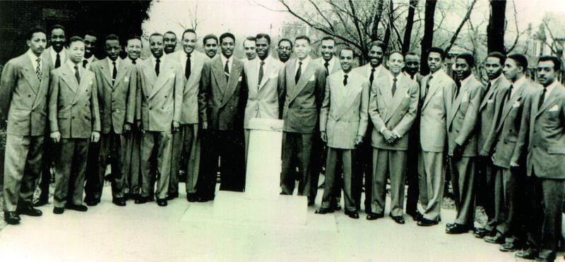 A group portrait of Andrew Young and his Alpha Phi Alpha fraternity brothers at Howard University circa 1950. Young (7th from right) became a member of the country's oldest Black fraternity in 1950. His dean of pledges was future New York City Mayor David Dinkins (first on left). From the book “The Many Lives of Andrew Young.” Copyright © 2022 by Ernie Suggs. Reprinted by permission of NewSouth Books. (Andrew Young Personal Collection)