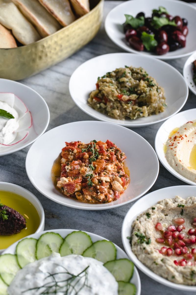 A selection of small dishes, known as mezze, is available at Zakia Modern Lebanese Restaurant in Buckhead. Courtesy of Erik Meadows/Zakia