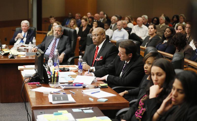 4/17/18 - Atlanta - Chief Assistant District Attorney Clint Rucker (center) and defense and prosecuting attorneys watch Defense attorney Bruce Harvey make final arguments for the defense today during the Tex McIver murder trial at the Fulton County Courthouse. Bob Andres bandres@ajc.com