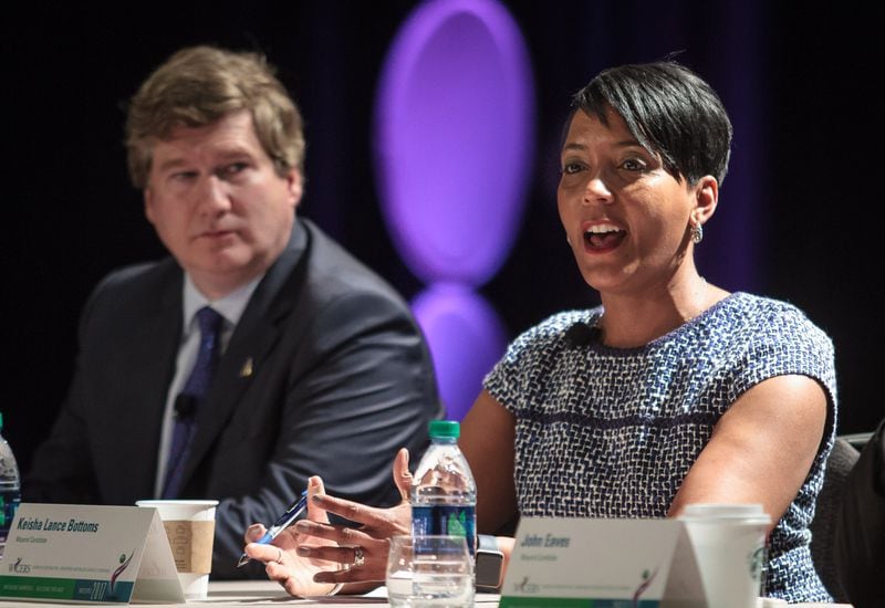Atlanta mayoral candidates Peter Aman and Keisha Lance Bottoms answer questions during a recent conference in Atlanta. 