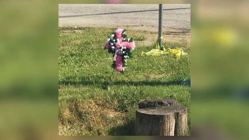 A memorial is in place for 10-year-old Kennade Patterson, who was killed Thursday after a pickup truck struck her while she crossed the street. (Credit: Ryan Nickerson)