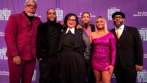 AJC hip-hop documentary filmmakers, (back row, left to right) writer/producer Ernie Suggs, co-director Ryon Horne, Byron Horne, co-director Tyson A. Horne and (front row) supervising producer Sandra Brown and writer/producer DeAsia Paige pose Nov. 2, 2023 outside Center Stage in Atlanta before the premiere of “The South Got Something to Say." Courtesy of Lauren Hubbard