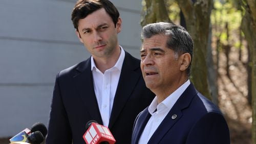 Secretary of Department of Health and Human Services Xavier Becerra speaks as Sen. Jon Ossoff looks on during a press conference at Ser Familia in Norcross on Monday, April 10, 2023. (Natrice Miller/natrice.miller@ajc.com)