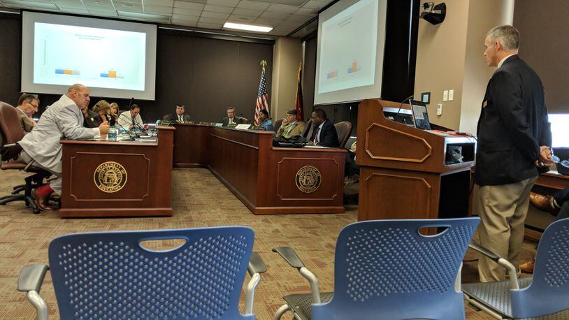 Aug. 22, 2018 -- Atlanta: Macon County School System Superintendent Marc Maynor (right) tells the Georgia Board of Education that he and his school board don't want to participate in the state board's "turnaround" program.
