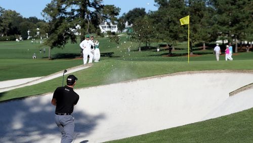 Patrick Cantlay hits out of the bunker on the 7th hole during the second round of the Masters Friday, Nov. 13, 2020 at Augusta National Golf Club in Augusta, Georgia. (Curtis Compton/Atlanta Journal-Constitution/TNS) 