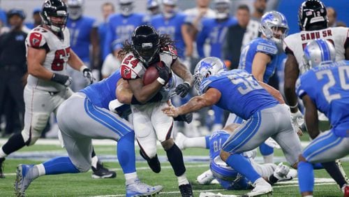 Atlanta Falcons running back Devonta Freeman (24) rushes during the first half of an NFL football game against the Detroit Lions, Sunday, Sept. 24, 2017, in Detroit. (AP Photo/Duane Burleson)