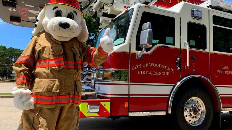With free parking, free lunch and free bounce houses, an open house is scheduled for 10 a.m. to 2 p.m. Oct. 8 at Headquarters/Station 14, 225 Arnold Mill Road by Woodstock Fire and Rescue. (Courtesy of Woodstock)