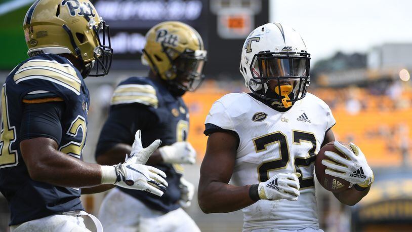 Clinton Lynch  of the Georgia Tech Yellow Jackets runs for a 3-yard touchdown in the fourth quarter during the game against the Pittsburgh Panthers at Heinz Field on September 15, 2018 in Pittsburgh, Pennsylvania. (Photo by Justin Berl/Getty Images)