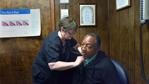 Dr. Karen Kinsell checks her patient Jimmie Fair at Clay County Medical Center in Fort Gaines on Thursday, October 19, 2017.
