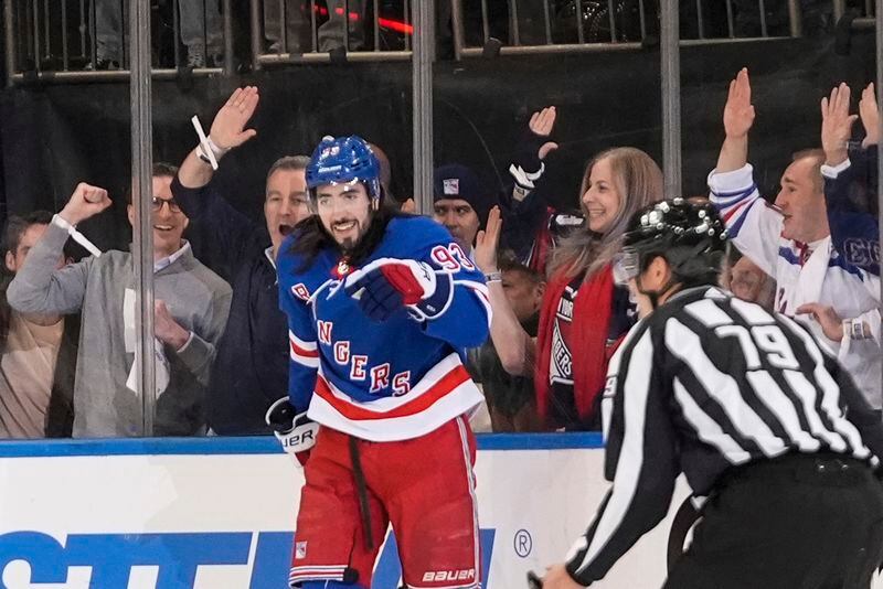 New York Rangers' Mika Zibanejad (93) celebrates after scoring a goal during the first period in Game 2 of an NHL hockey Stanley Cup first-round playoff series against the Washington Capitals, Tuesday, April 23, 2024, in New York. (AP Photo/Frank Franklin II)