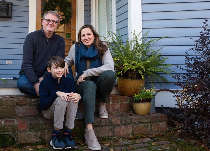 Elizabeth Feichter (right) poses for a portrait with husband Frank White (left) and son Dylan Feichter-White (middle) at their home in Atlanta on Friday, Dec. 18, 2020. Feichter is the founder of the Atlanta Food and Wine Festival, but is currently working to develop new businesses because of the festival’s cancellation due to COVID-19. (Christina Matacotta for The Atlanta Journal-Constitution)