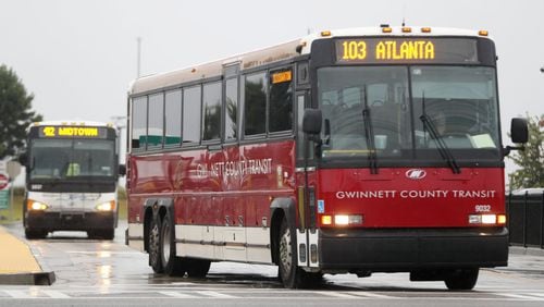 Gwinnett County Transit express buses depart for downtown Atlanta from the Express Bus Park and Ride lot at Sugarloaf Mills in Lawrenceville. BOB ANDRES /BANDRES@AJC.COM AJC FILE PHOTO