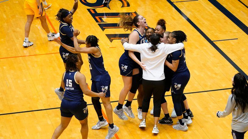 Georgia Tech players celebrate their win over West Virginia in the second round of the NCAA women's Tournament Tuesday, March 23, 2021, at the UTSA Convocation Center in San Antonio, Texas. (Scott Wachter/NCAA)