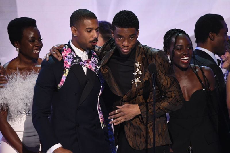 Jan 27, 2019; Los Angeles, CA, USA; From left, Danai Gurira, Michael B. Jordan, Chadwick Boseman and Lupita Nyong’o celebrate on stage as the cast of “Black Panther” accepts the award for outstanding performance by a cast in a motion picture the 25th Annual Screen Actors Guild Awards at the Shrine Auditorium. Mandatory Credit: Robert Hanashiro-USA TODAY NETWORK (Via OlyDrop)