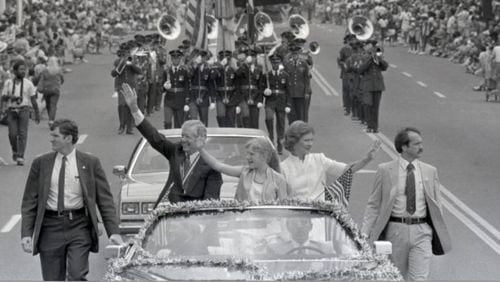 Former President Jimmy Carter was greeted by cheers and applause along the parade route in downtown Atlanta, July 4, 1981. (AJC Photographic Archive, Georgia State University Library)