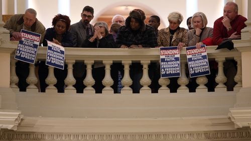 January 13, 2015 Atlanta: An overflow crowd lines the railings above the Capitol Rotunda during a rally in support of fired Atlanta Fire Chief Kelvin Cochran on Tuesday afternoon January 13, 2015. BEN GRAY / BGRAY@AJC.COM AJC file/Ben Gray, bgray@ajc.com