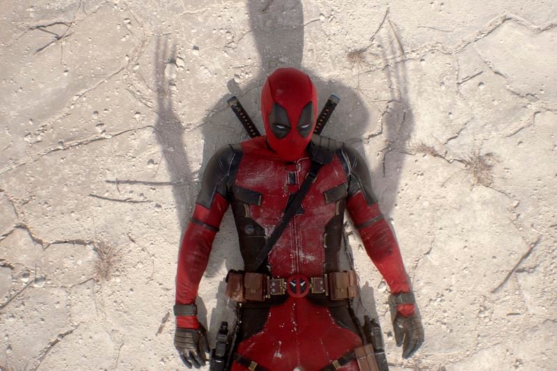 This image released by 20th Century Studios/Marvel Studios shows Ryan Reynolds as Deadpool/Wade Wilson in a scene from "Deadpool & Wolverine." (20th Century Studios/Marvel Studios via AP)