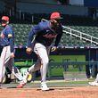 Atlanta Braves designated hitter Marcell Ozuna (center) warms up during the first full-squad spring training workout at CoolToday Park, Tuesday, Feb. 20, 2024, in North Port, Florida. (Hyosub Shin / Hyosub.Shin@ajc.com)