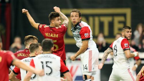 Hector 'Tito' Villaba watches the ball going towards the goal for the third goal of the team, Atlanta United beat the DC United on the first home team of the 2018  MLS season on March 11, 2018 in Atlanta Ga.