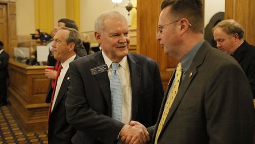 Sen. Lindsey Tippins, R-Marietta, (left) shakes hands with Rep. Kevin Tanner, R-Dawsonville, after Senate passage Friday of Tanner’s school turnaround legislation, House Bill 338. It’s the General Assembly’s answer to voter rejection of the Opportunity School District constitutional amendment in November.
