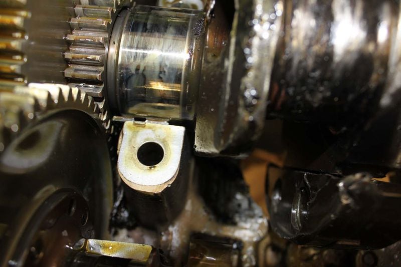 The National Transportation Safety Board said this close-up photo of the engine of a crashed Beechcraft Bonanza shows a bearing that had shifted, which contributed to the crash of the plane, piloted by Randy Hunter. The plane crashed near Savannah in 2017, killing Hunter along with Byron Cocke and Catherine Cocke, a couple aboard. (Courtesy of the National Transportation Safety Board)
