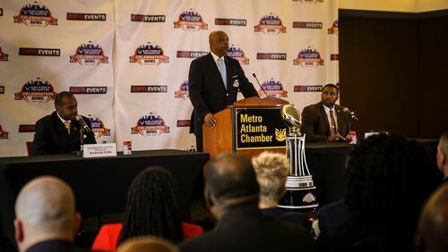 John Grant, the executive director of the Celebration Bowl, speaks at the game’s news conference Dec. 8, 2016 while coaches Broderick Fobbs (left) of Grambling State and Jerry Mack of North Carolina Central sit on either side of him. (Candace Ledbetter/ Liquid Soul)