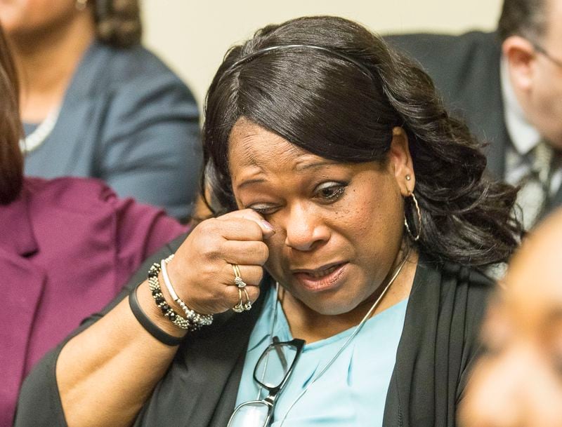 10/14/2019 -- Decatur, Georgia -- Carolyn Baylor Giummo, mother of Anthony Hill, reacts as the jury reads the verdict for the Robert "Chip" Olsen trial in front of DeKalb County Superior Court Judge LaTisha Dear Jackson at the DeKalb County Courthouse in Decatur, Monday, October 14, 2019. (Alyssa Pointer/Atlanta Journal Constitution)