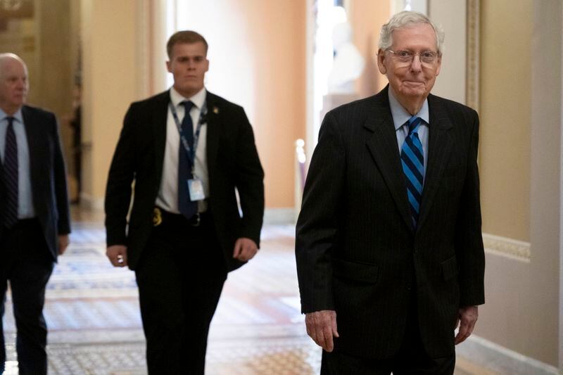 Minority Leader Sen. Mitch McConnell walks to the Senate Chambers before House Impeachment managers deliver the Secretary Mayorkas Impeachment Articles to the Senate on Monday, April 15, 2024, in Washington. (AP Photo/Kevin Wolf)