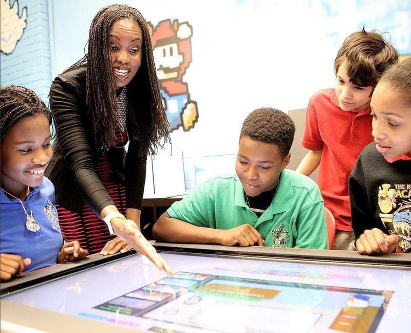 Math teacher Valerie Camille Jones uses ActivTables in her class for group work and to help the students visualize the math they are learning. Jones teaches at the Ron Clark Academy. CONTRIBUTED BY J. AMEZQUA