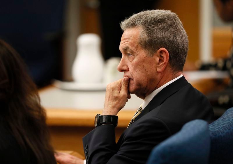 April 26, 2019 - Lawrenceville - District Attorney Danny Porter watches as assistant district attorney Lisa Jones presents autopsy photos to the jury.  The prosecution continued it's case in the third day of the Tiffany Moss murder trial.  Moss, who is representing herself, is accused of intentionally starving her 10-year-old stepdaughter Emani to death in the fall of 2013.   Bob Andres / bandres@ajc.com