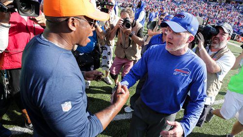 ORCHARD PARK, NY - SEPTEMBER 24: Head coach Vance Joseph of the Denver Broncos and head coach Sean McDermott of the Buffalo Bills greet at midfield after an NFL game on September 24, 2017 at New Era Field in Orchard Park, New York. (Photo by Brett Carlsen/Getty Images)