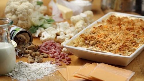 The cauliflower casserole, dubbed Company Casserole on the original recipe card from grandma, called for Old English cheese slices and canned mushrooms. (E. Jason Wambsgans/Chicago Tribune/TNS)