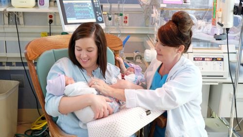 Kayde Reynolds, left, is visited by Debbie Patrick RN, a certified lactation consultant at WellStar Cobb Hospital. Courtesy photo.