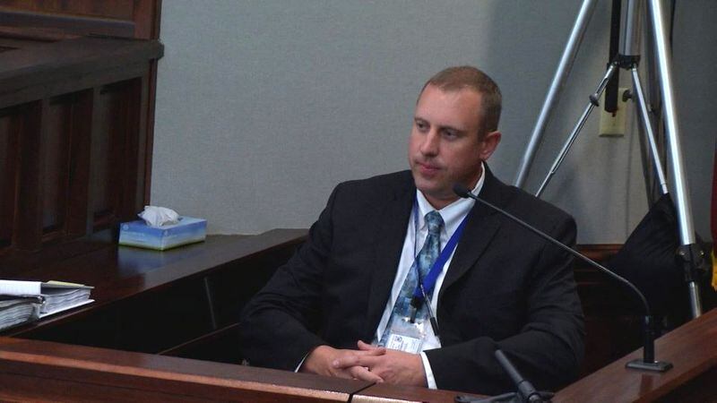 Cobb County detective Shawn Murphy testifies at the murder trial of Justin Ross Harris at the Glynn County Courthouse in Brunswick, Ga., on Friday, Oct. 28, 2016. Murphy said that he obtained search warrants for Harris' home, car and computers, and interviewed Harris' coworkers at Home Depot. (screen capture via WSB-TV)