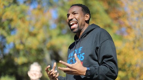 Councilman and mayoral candidate Andre Dickens speaks at a meet-and-greet in Grant Park on Saturday, Nov. 20. Miguel Martinez for The Atlanta Journal-Constitution