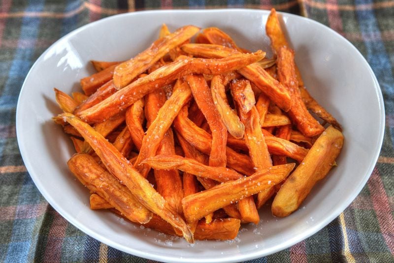 Justin Manglitz, the head whiskey maker at Atlanta’s ASW Distillery, is also a dedicated sweet potato-grower and home cook. He showed us how to make these sweet-potato fries. (PHOTO CONTRIBUTED BY CHRIS HUNT; STYLING BY WENDELL BROCK)
