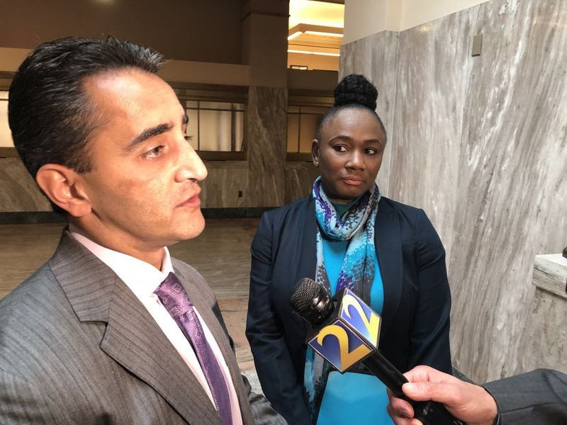 Attorney Ash Joshi, left, and his client, Francine Williams, speak after a Civil Service Board hearing Wednesday, May 30, 2018, at Atlanta City Hall. Joshi said Williams was improperly fired for allegedly discarding an open records request she said she determined to be a duplicate of an earlier fulfilled request. Joshi said his client was interviewed by the GBI as part of the state probe into open records abuses at City Hall. J. Scott Trubey/strubey@ajc.com.
