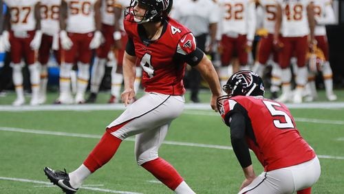 Falcons kicker Giorgio Tavecchio misses a field goal attempt against the Washington Redskins during the first quarter.  Curtis Compton/ccompton@ajc.com