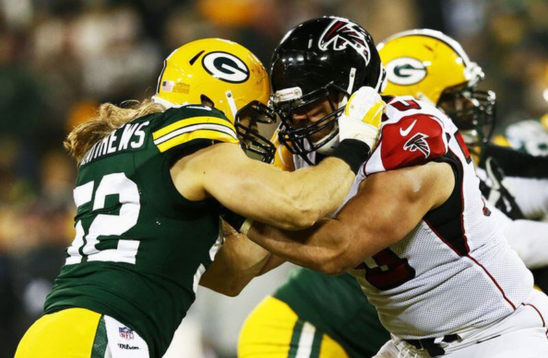 Clay Matthews #52 of the Green Bay Packers defends against Jake Matthews #70 of the Atlanta Falcons in the third quarter at Lambeau Field on December 8, 2014 in Green Bay, Wisconsin. (Dec. 7, 2014 - Source: Kevin C. Cox/Getty Images North America)