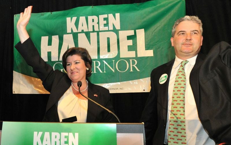 Karen Handel, pictured with her husband Steve, ran unsuccessfully for governor in 2010. Her campaign reports from the race showed an unreconciled campaign debt. HYOSUB SHIN / HSHIN@AJC.COM